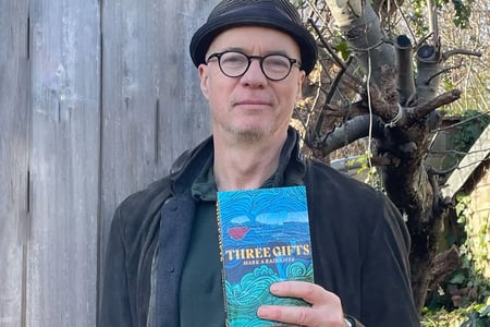 Mark Radcliffe with his book, Three Gifts.
