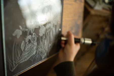 Phoebe Connolly working on Skylark test panel for Cherryburn. (Photo by Georjie Adams)