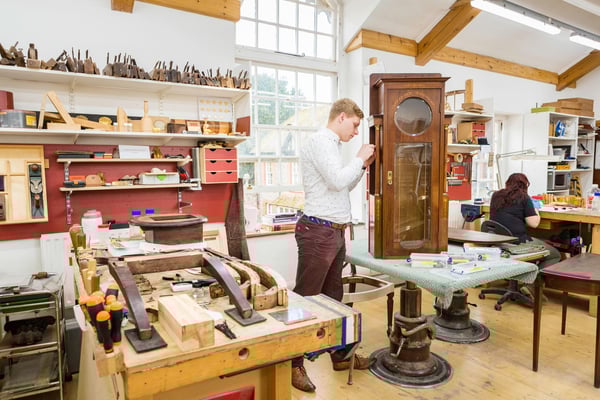 Student in the furniture workshop at West Dean College of Arts and Conservation
