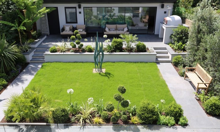 Contemporary garden in Richmondwith tropical planting by Jane Ashley