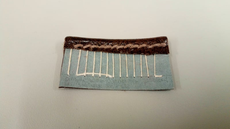 Figure 9: Saddle stitch endband model sewn with leather strip (front view)