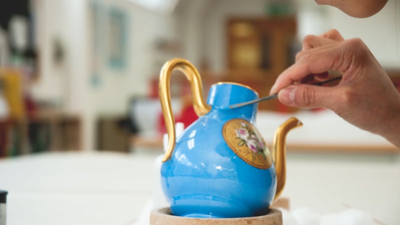 Conserving a blue ceramic jug at West Dean College of Arts and Conservation