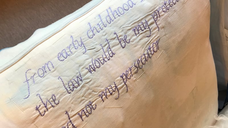 Law Quilt, pillows. Pictured on display for the COMING IN exhibition. Image credit Scott Keir.