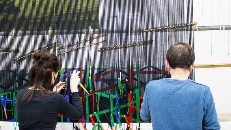 Eleanor Rudd and Philip Sanderson working on the Eva Rothschild tapestry