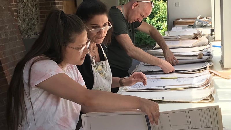 Students sorting through documents.