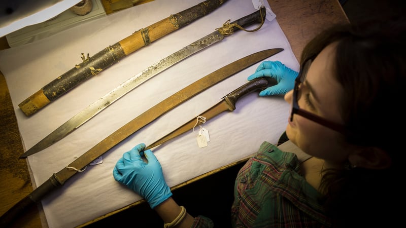 Metalwork student looking at knives at West Dean College of Arts and Conservation