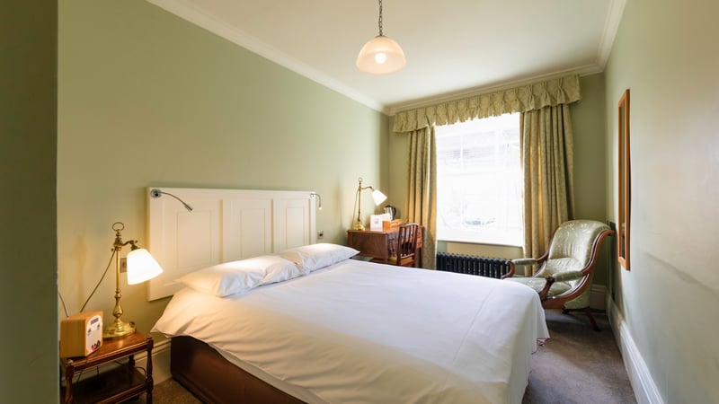 Double bedroom at West Dean College Credit Chris Ison