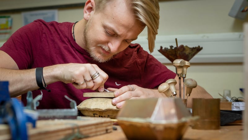 Metal work student at West Dean College of Arts and Conservation