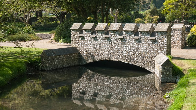 Flint bridge at West Dean Gardens West Sussex