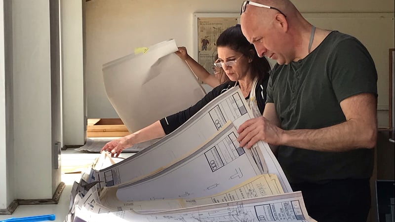 Students sorting through documents.