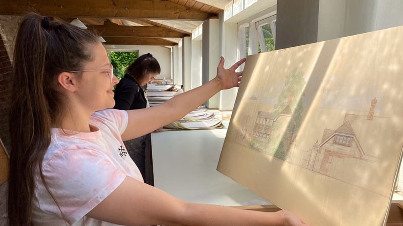 Students sorting through documents at West Dean College
