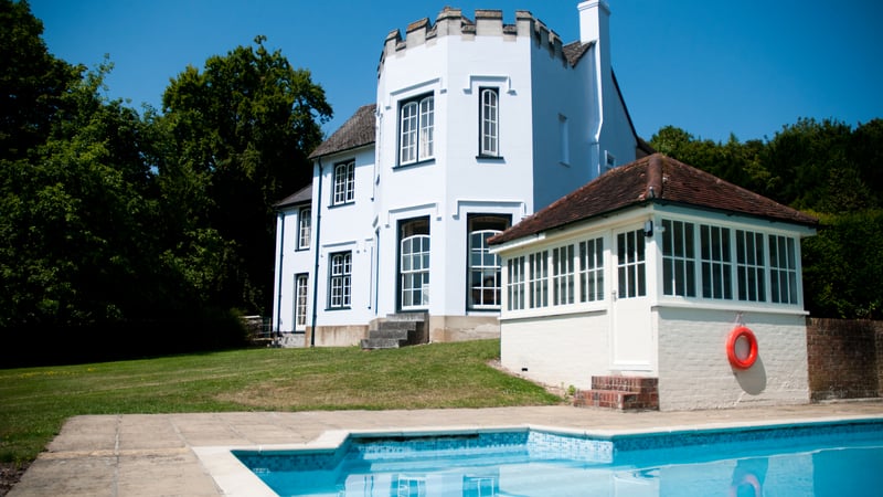 The exterior of the Vicarage and Swimming Pool