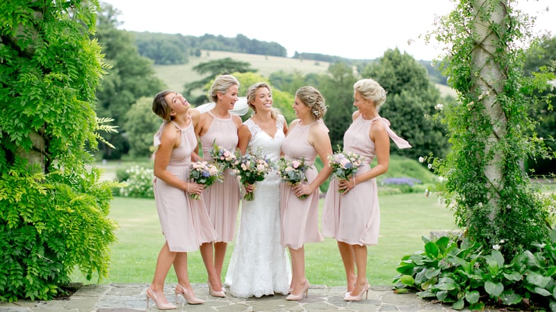 Bridesmaids in the Pergola at West Dean Gardens. Credit Helen Cawte