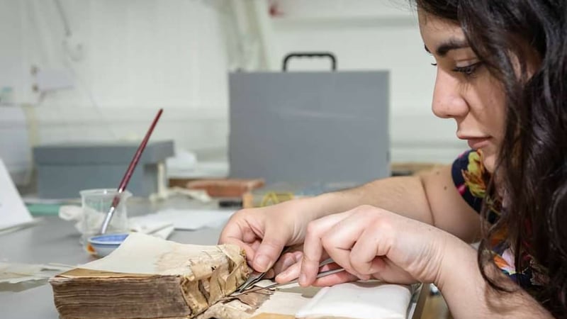 Maria working at the Books and Library Material studio. West Dean College of Arts and Conservation (Image: Christopher Ison)
