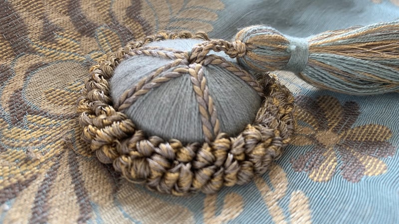 Button with tassel by Clare Hedges