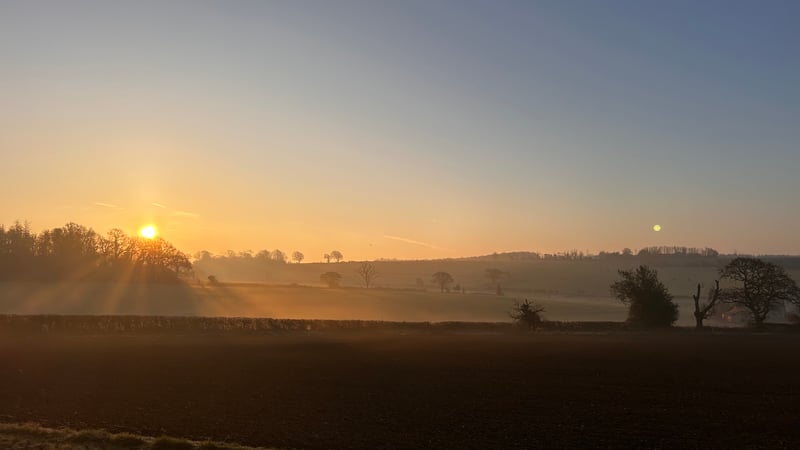 First light and sunrise across West Dean