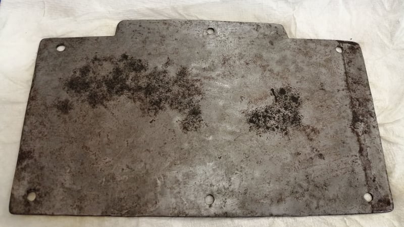 Fig 8. Interior panel during and after the application of PeekTM polishing compound, showing the areas of black corrosion which were present before exposure to water.