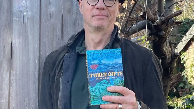Mark Radcliffe with his book, Three Gifts.