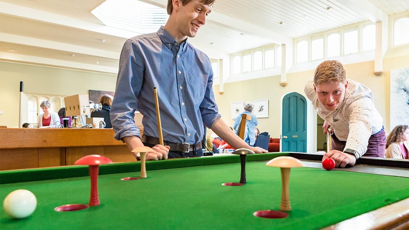 Students socialising in the bar at West Dean College