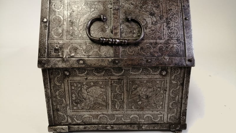 Fig 1 and 2. Iron casket prior to exposure to water. Showing the exterior and the locking mechanism in the lid.