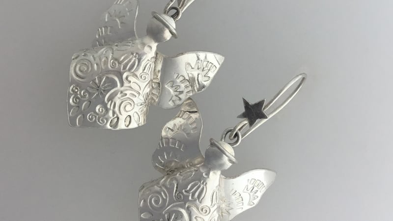 Silver angel earring by Sarah Macrae