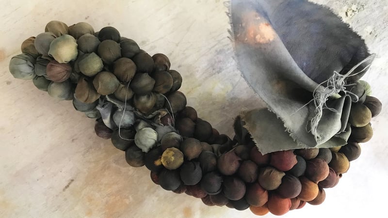 Artwork tied with pie weights, Deborah Weir