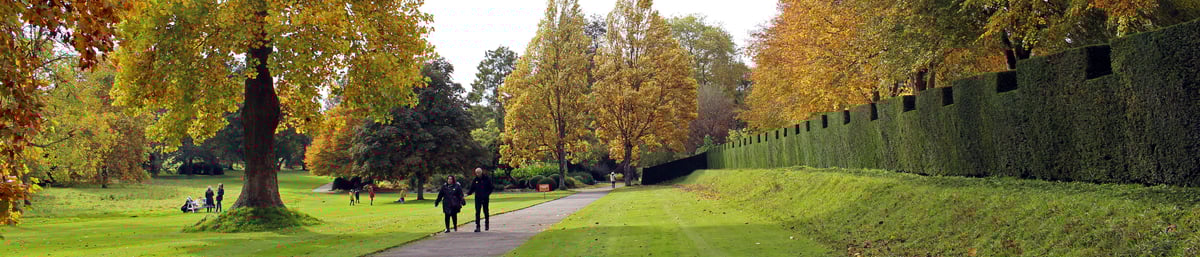 Visitors in West Dean Gardens in autumn