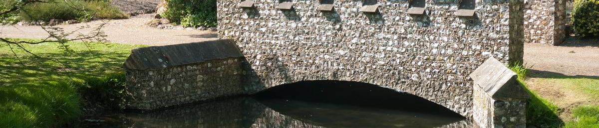 Flint bridge at West Dean Gardens West Sussex
