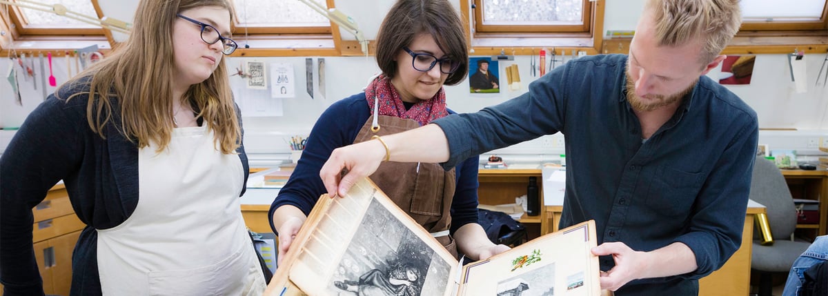 Conservation of Books students analysing book at West Dean