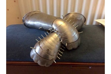 Two gauntlets made by a student at West Dean College