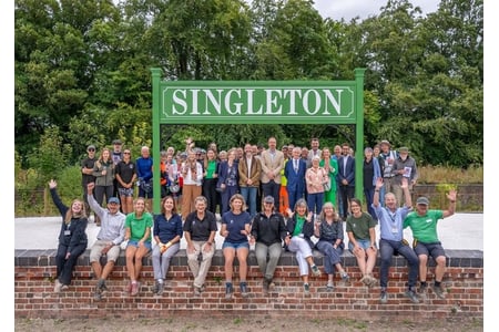 Pictured: Anna Gough-Yates (Chief Executive and Principal), Ian Graham (Director of Estate) and Maddy Crews (West Dean Ranger) pictured with South Downs National Park Authority, other partners and trail users at the official opening event.