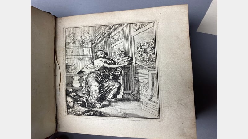 Remains of the torn out page, presumably the ex praemio.