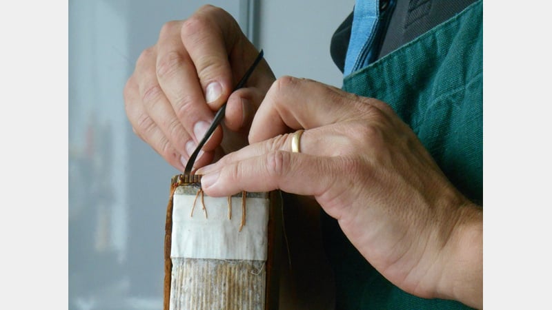 Tutor Ian Watson Conserving a Book