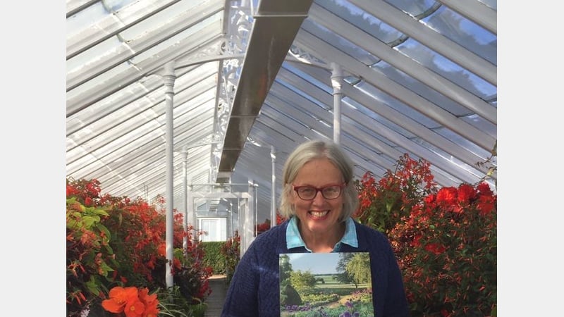 Sarah Wain holding 'At West Dean'