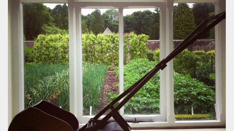 Vintage lawn mowers on display at West Dean Gardens