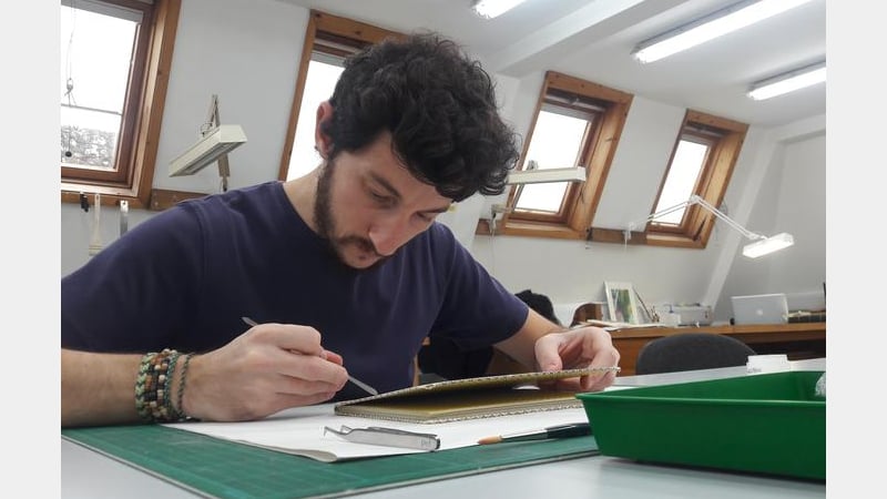 Simon prepares Mount Zion for display