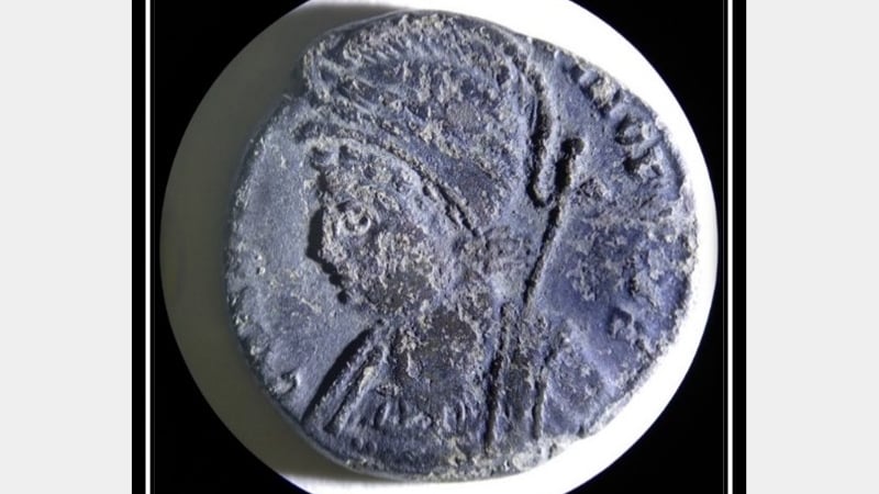 Figure 1. Roman coin under 10x microscope with raking light, measuring about 17mm diameter