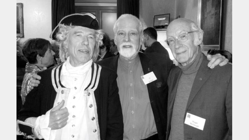 Garry Brooking as Captain Cook (left), alongside Ed Berman (centre) and Roger McGough (right)