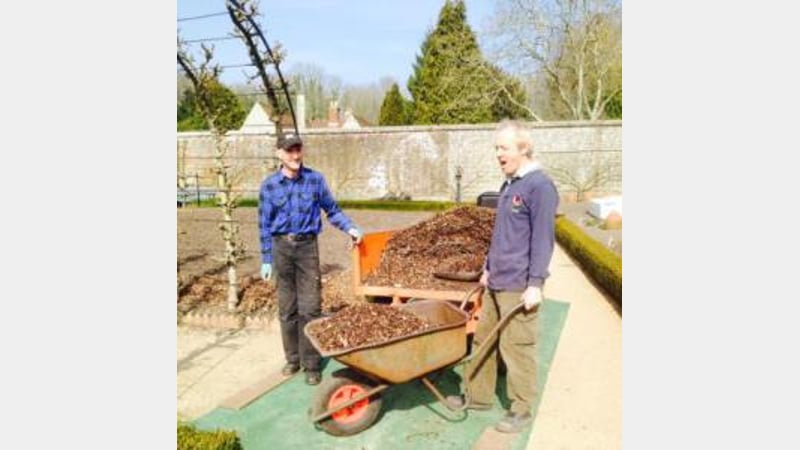 Volunteer gardners helping at West Dean Gardens