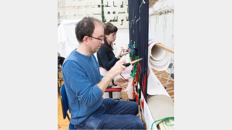 Philip Sanderson working on the Eva Rothschild tapestry at West Dean Tapestry Studio