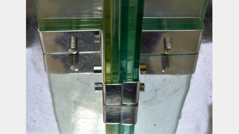 Detail of the replaced rivet and the foam pad. Detail of the condition of the metal base, photo courtesy of Sujin Jung.