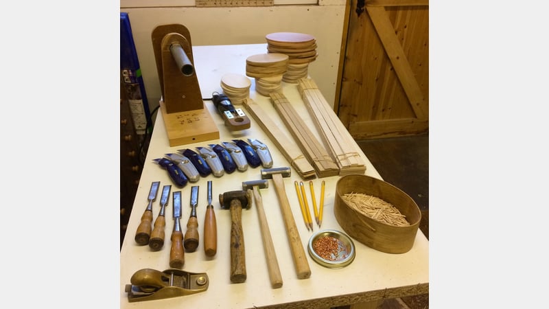 Tools and materials laid out to make a Shaker box