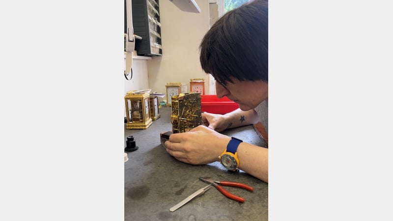 Working on a Vienna grand sonnerie wall clock