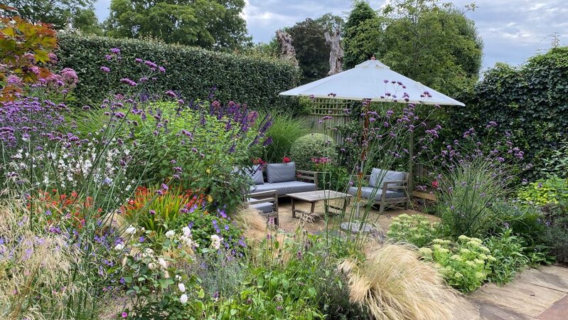 Colourful family garden in St Margaret West London by Jane Ashley