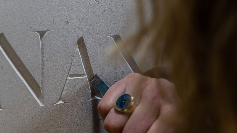 Letter Carving on Stone Tablet