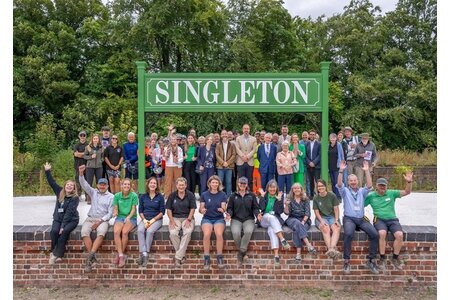 Pictured: Anna Gough-Yates (Chief Executive and Principal), Ian Graham (Director of Estate) and Maddy Crews (West Dean Ranger) pictured with South Downs National Park Authority, other partners and trail users at the official opening event.